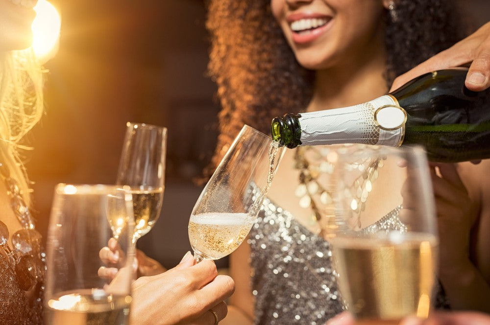 https://www.brightcellars.com/cdn/shop/articles/New-years-champagne-toast-sparkle-celebration-new-years-resolutions_shutterstock_3044d716-bbc0-4f80-a03a-ac12a59785ed.jpg?v=1679087016
